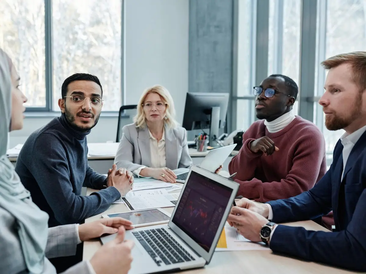 Professionals in a conference room discussion