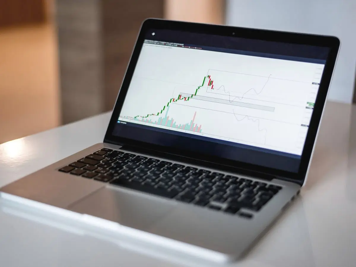Laptop showing a financial chart