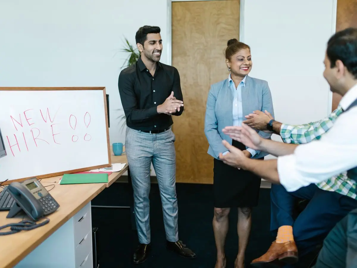 Colleagues welcoming a new hire