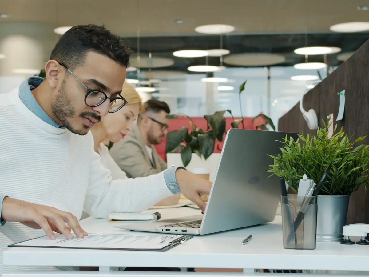 Professionals working in an open office