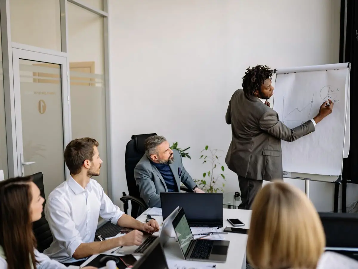 Presenter leading a team meeting