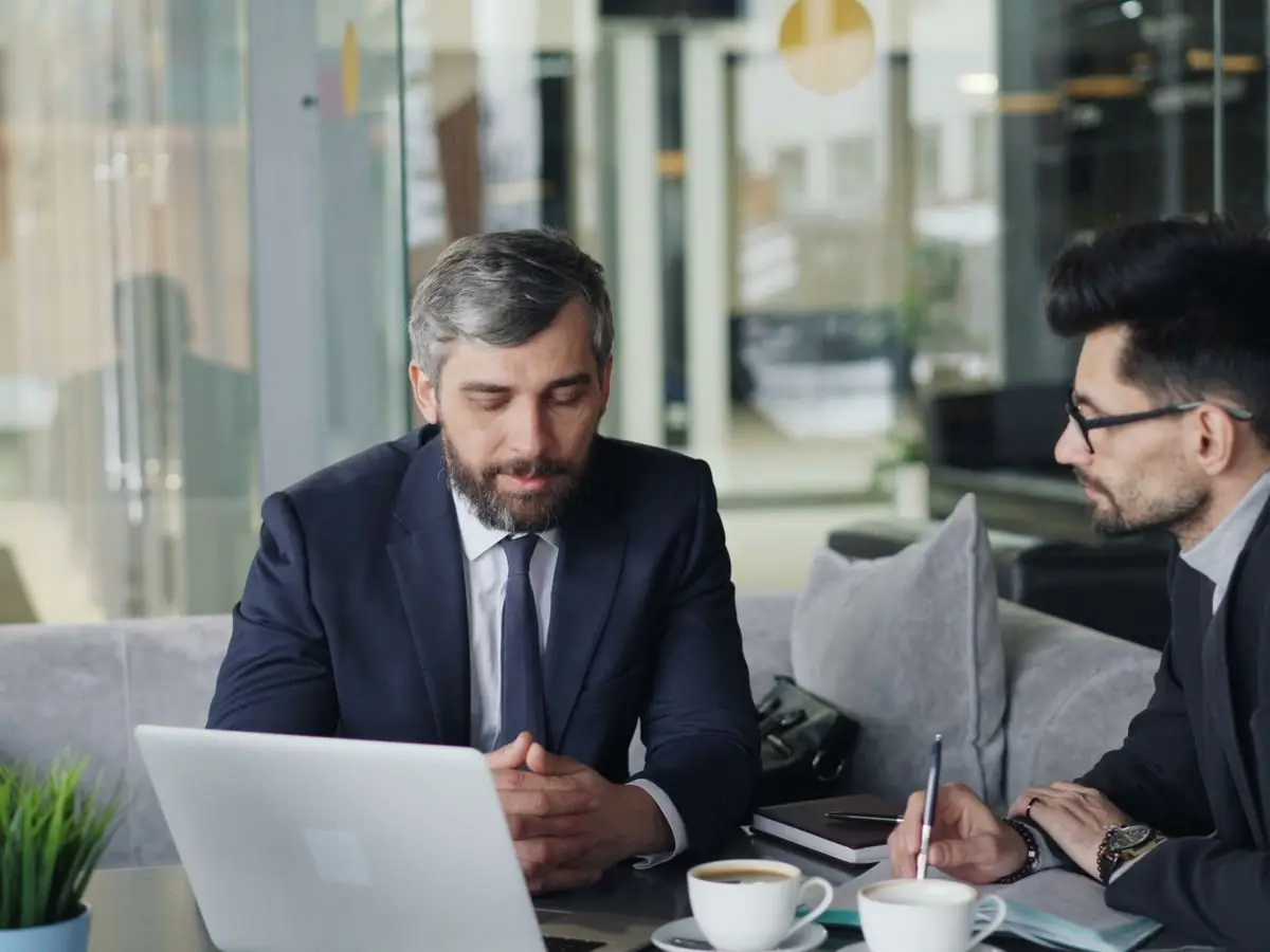 Two consultants discussing strategy