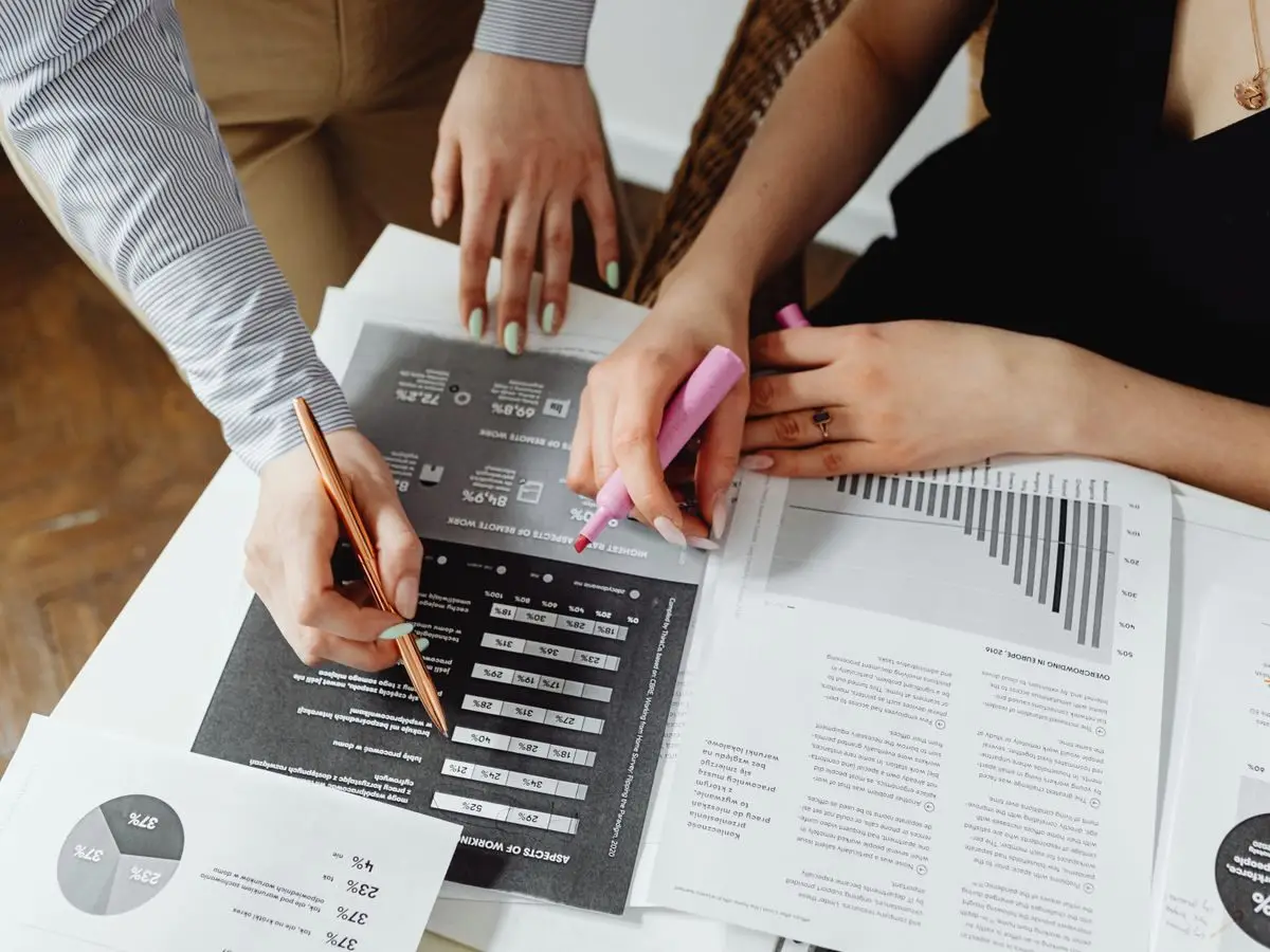 Financial analysis with charts and highlighters