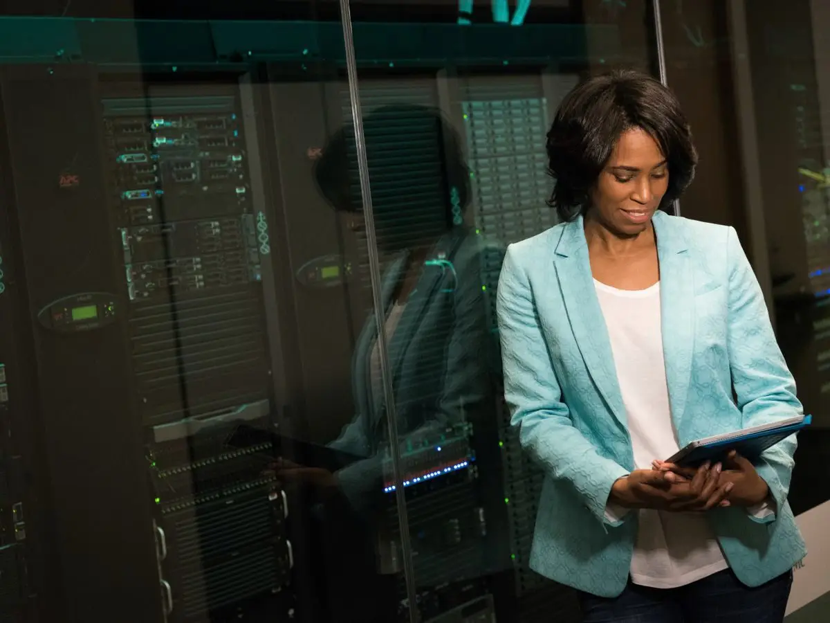 IT professional checking servers in a data centre