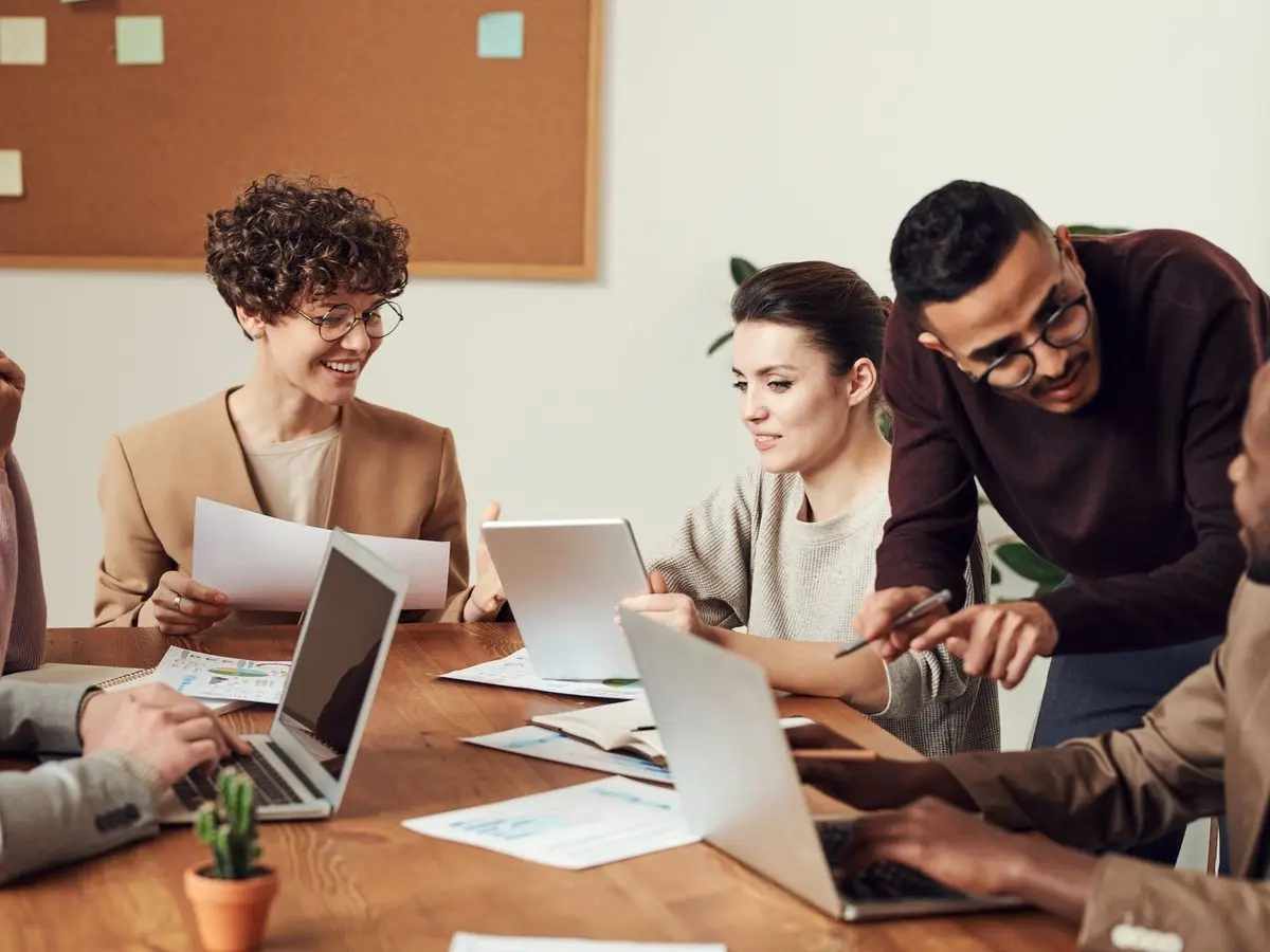 Consultants working together around a table