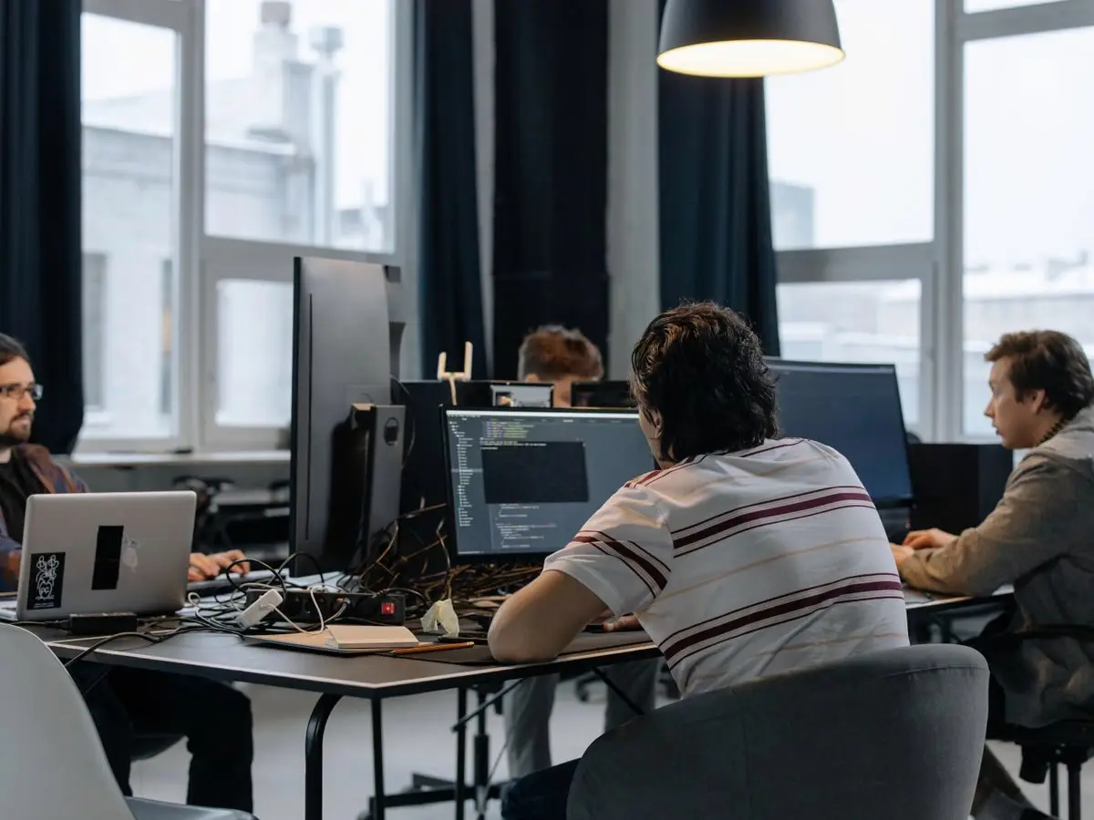 Developers working together in a tech office